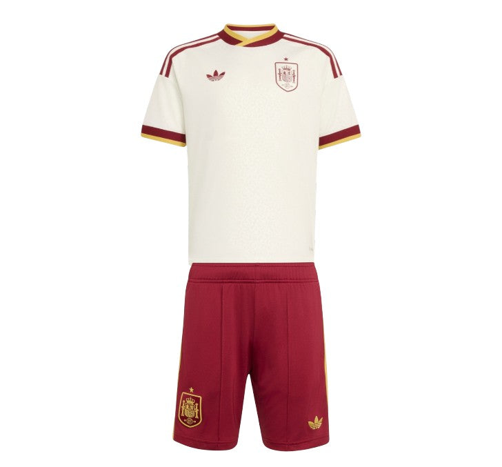 Conjunto de roupa infantil da Velukz inspirado na seleção espanhola para a Copa de 2026, com cores e detalhes oficiais.