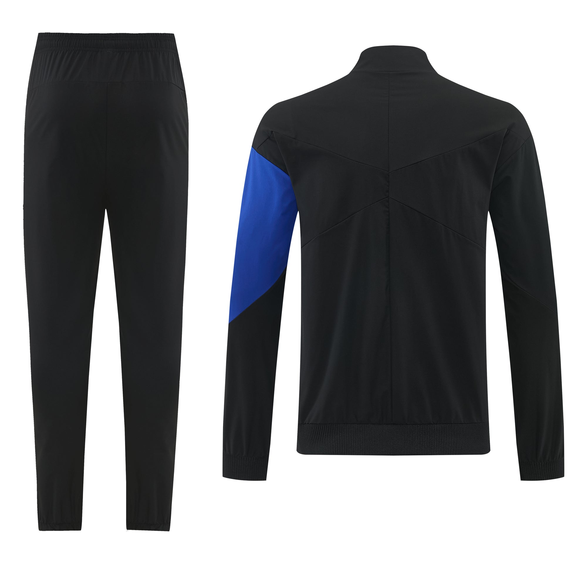 Fato de treino Velukz Chelsea 26/27, conjunto de roupa esportiva, com calças e jaqueta, em cores preto e branco, para atividades físicas.