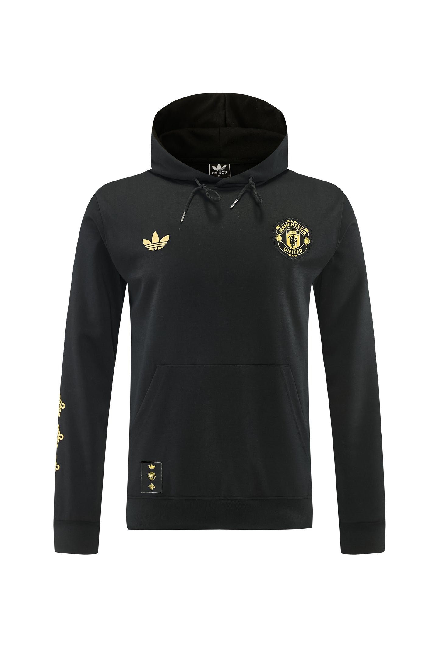 Conjunto de moletom Manchester United 26/27 da Velukz em fundo claro, destacando o logo do time e detalhes do tecido.