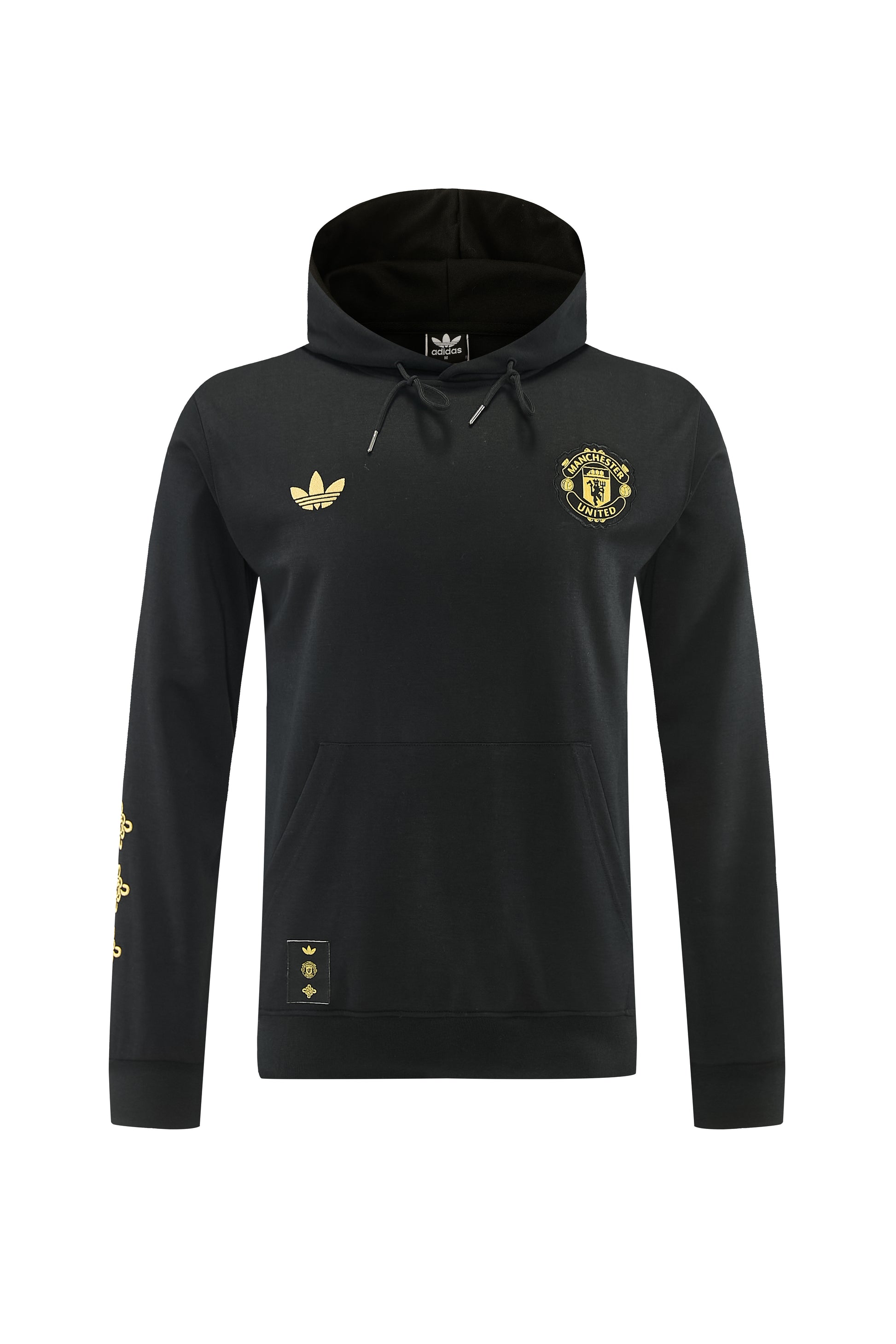 Conjunto de moletom Manchester United 26/27 da Velukz em fundo claro, destacando o logo do time e detalhes do tecido.