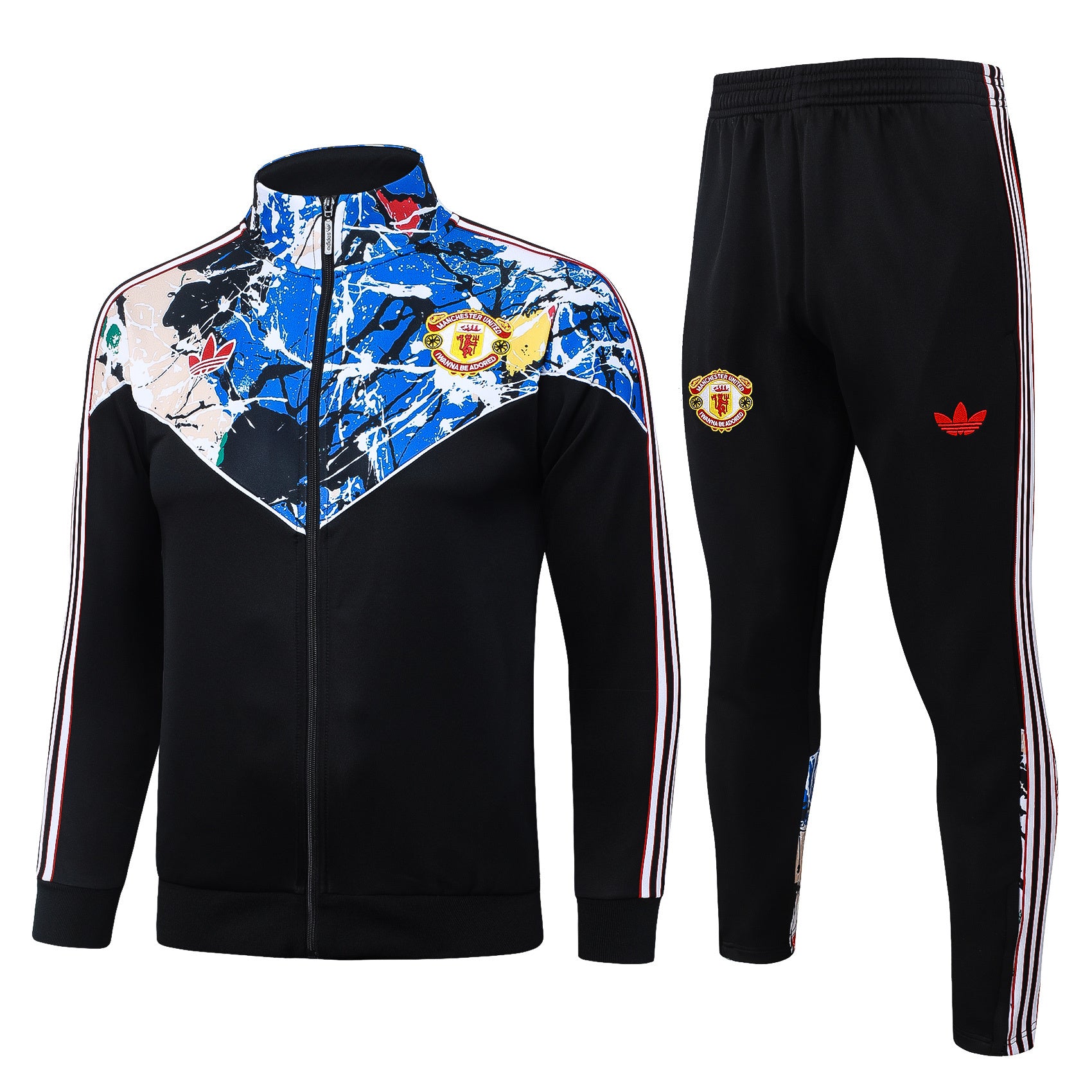 Conjunto de treino Manchester United 26/27 da Velukz, com camisola e calças, em tecido confortável e design oficial do clube.