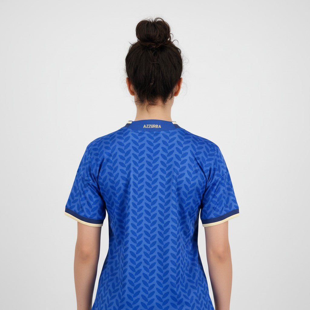 T-Shirt Principal Mulher Itália 2026 da Velukz, camiseta branca com design relacionado ao evento esportivo.