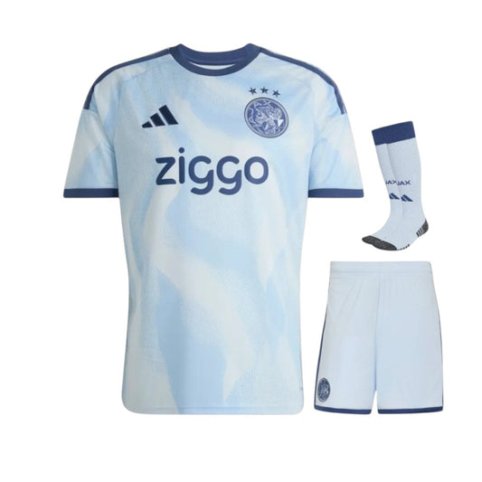 Camiseta infantil do terceiro uniforme do Ajax 26/27, marca Velukz, com logo do time em destaque e detalhes em azul e branco.