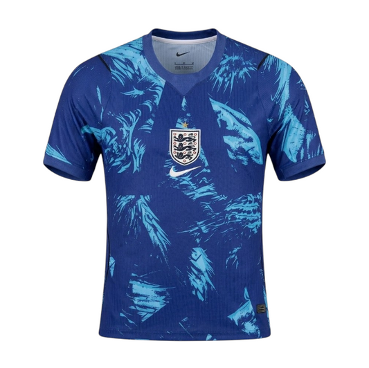 Camiseta Velukz de aquecimento Inglaterra 2026, com design detalhado, vista frontal sobre fundo branco.