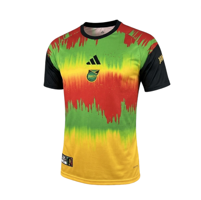 Camiseta Velukz Jamaica 2026 de aquecimento, camiseta esportiva branca com logotipo e detalhes em verde e amarelo.