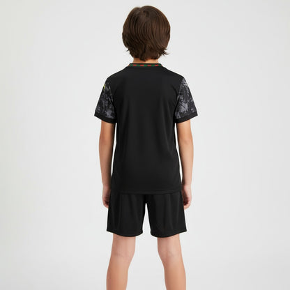 Velukz Kit Criança Especial Portugal 26/27 featuring vibrant colors and team logo on a youth-sized jersey and shorts.