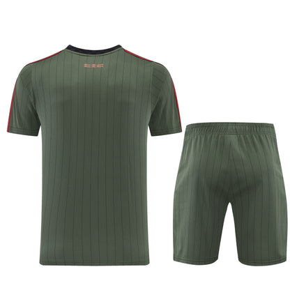 Conjunto de roupa esportiva Velukz Bayern Munique, camisa e calções com logotipo do clube, em cores azul e branco.