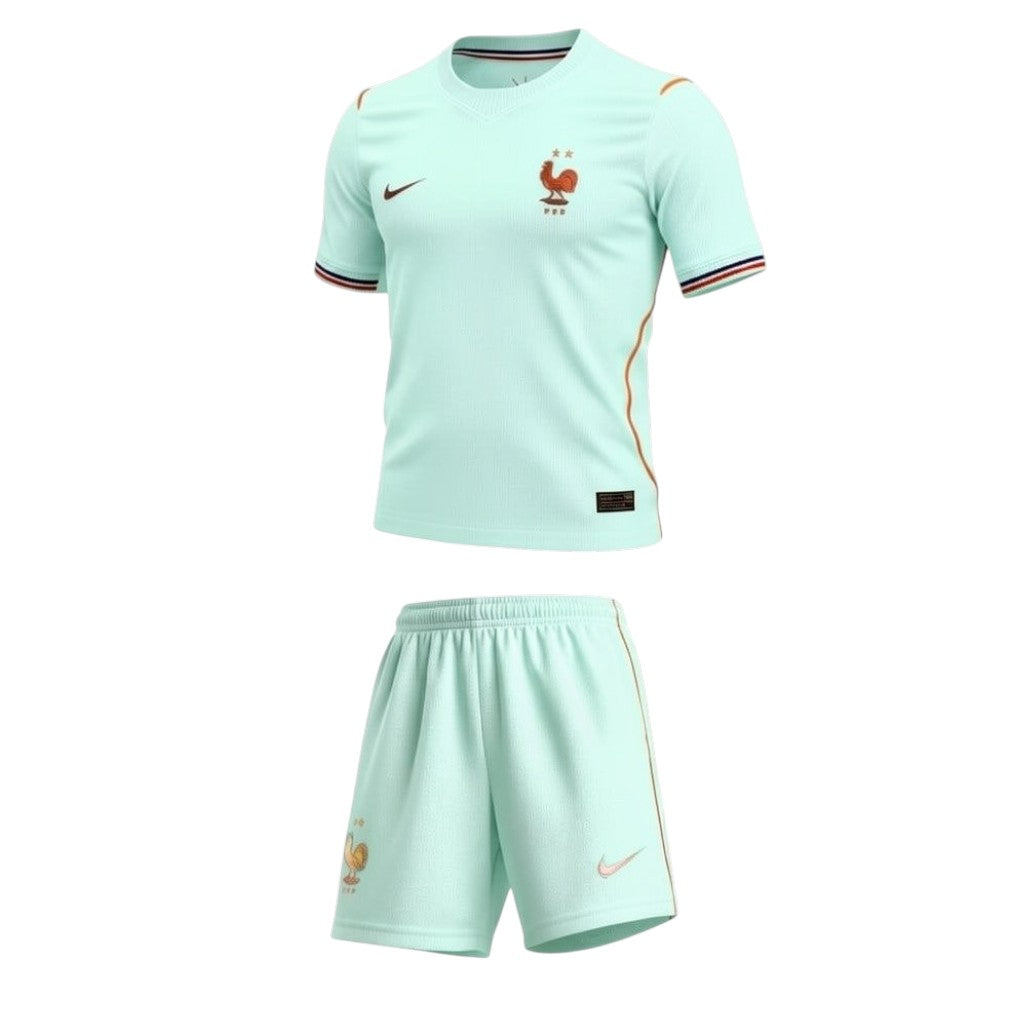 Kit criança Velukz França 2026, uniforme com detalhes da seleção, ideal para fãs jovens, em cores azul, branco e vermelho.